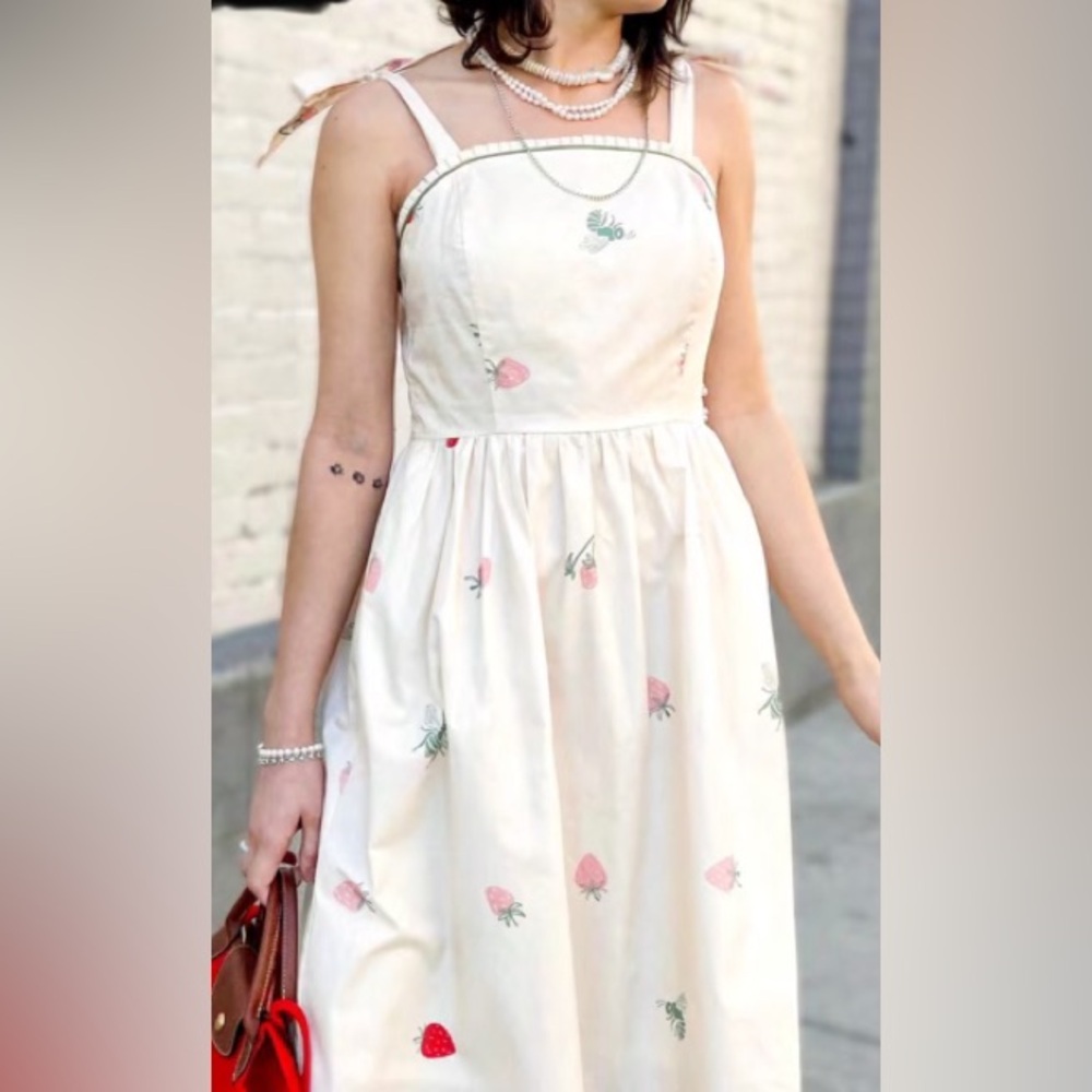 Sundress in creamy vanilla color with soft pink strawberries